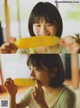 A woman eating a corn on the cob. 